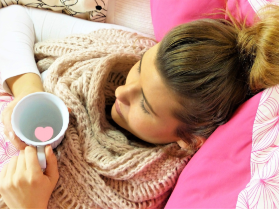 a woman relaxing with a mug