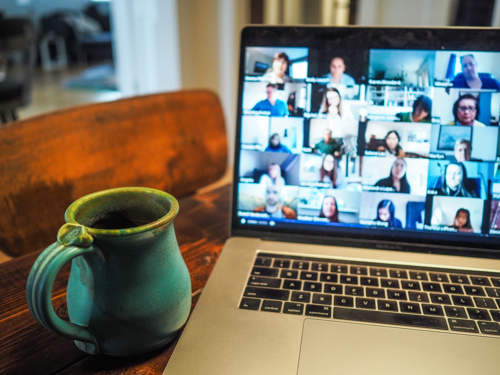 Zoom meeting on laptop coffee mug eLearning