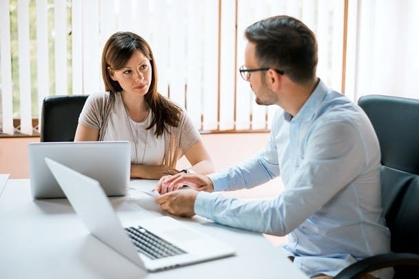 woman and man meeting with boss laptops online learning
